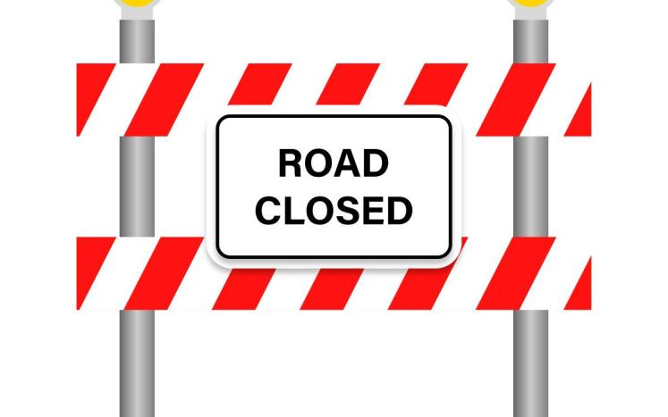 Road Closed sign red and white